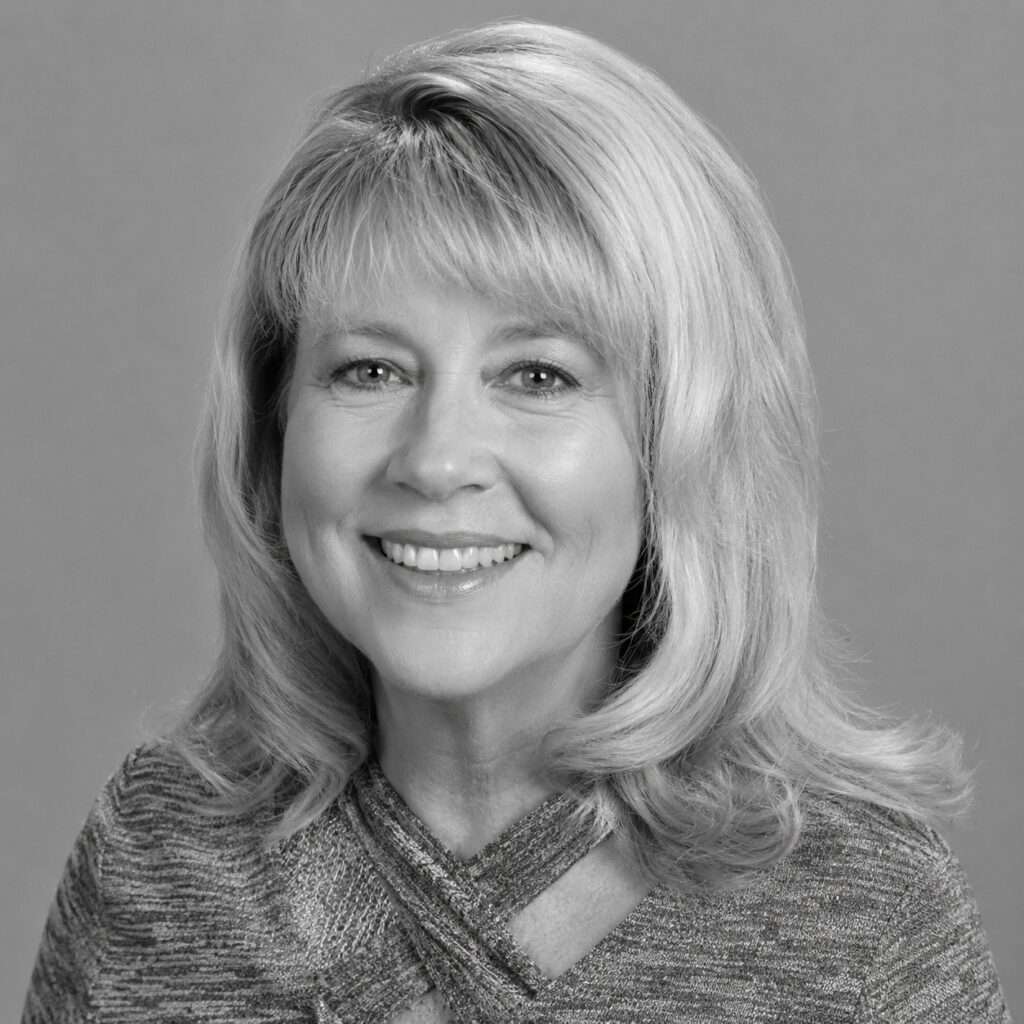 Smiling woman portrait with gray background
