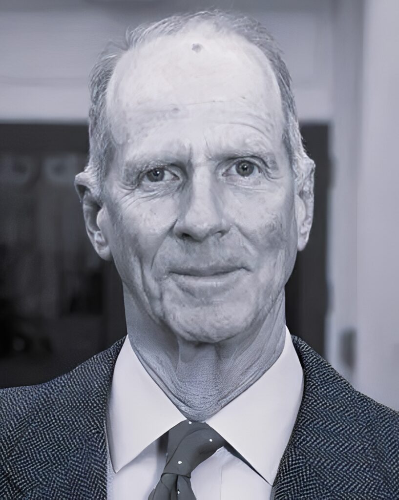 Older man wearing suit and tie