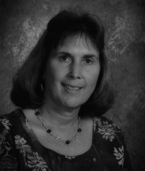 Smiling woman with necklace