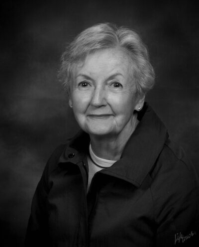 Senior woman smiling in studio photo