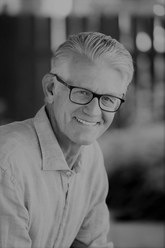 Elderly gentleman in glasses, smiling