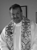 Priest wearing embroidered vestment