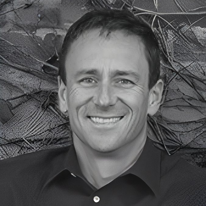 Black-and-white smiling man portrait