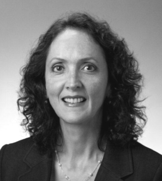 Smiling woman with curly hair
