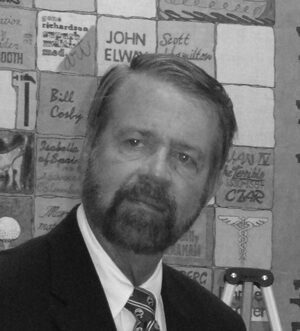 Black-and-white portrait of a bearded man