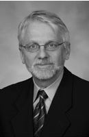 Senior man in suit and tie