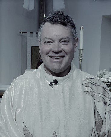 Priest in a church setting