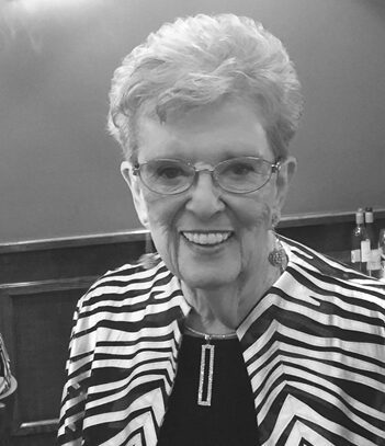 Happy senior lady in black and white