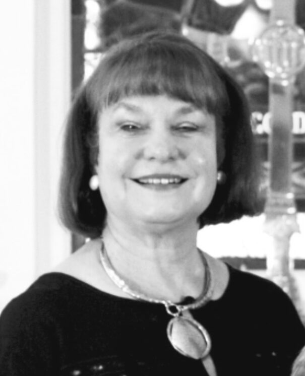 Woman wearing a necklace and earrings