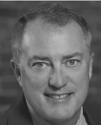 Smiling man in black and white photo