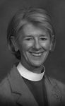 Smiling person in clerical attire