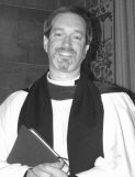 Clergyman holding a book