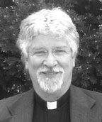 Clergyman with white hair and beard