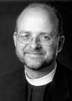 Smiling man in black and white photo