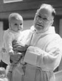 Religious figure with child in robes