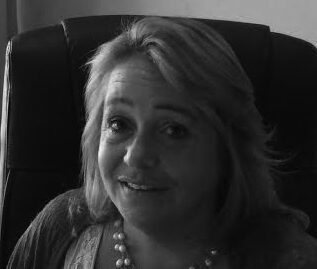 Smiling woman sitting on a chair