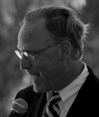 Man speaking into a microphone