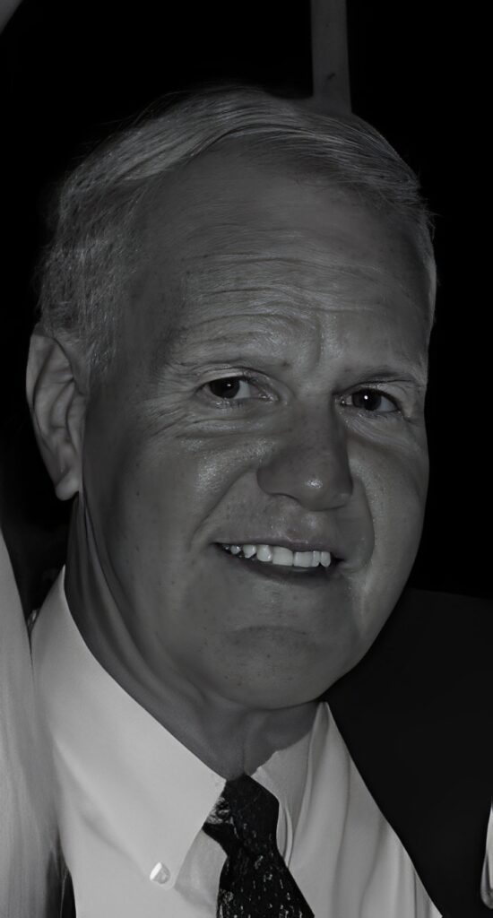 Smiling man wearing suit and tie