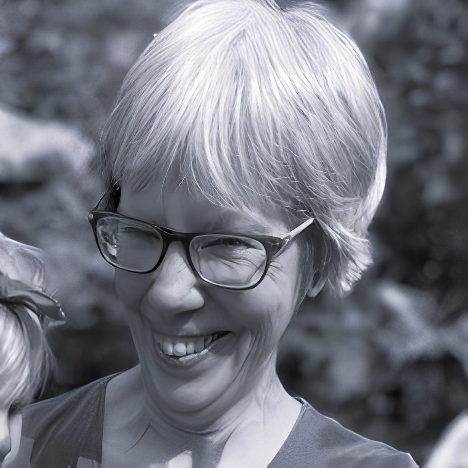 Smiling woman wearing glasses outdoors