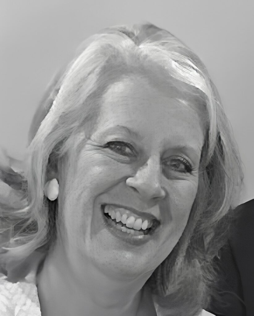 Smiling gray-haired woman portrait, black and white