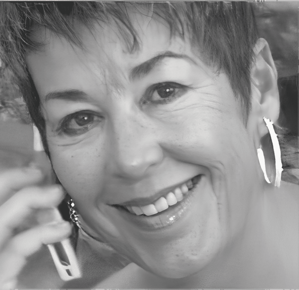 Close-up smiling woman talking on phone
