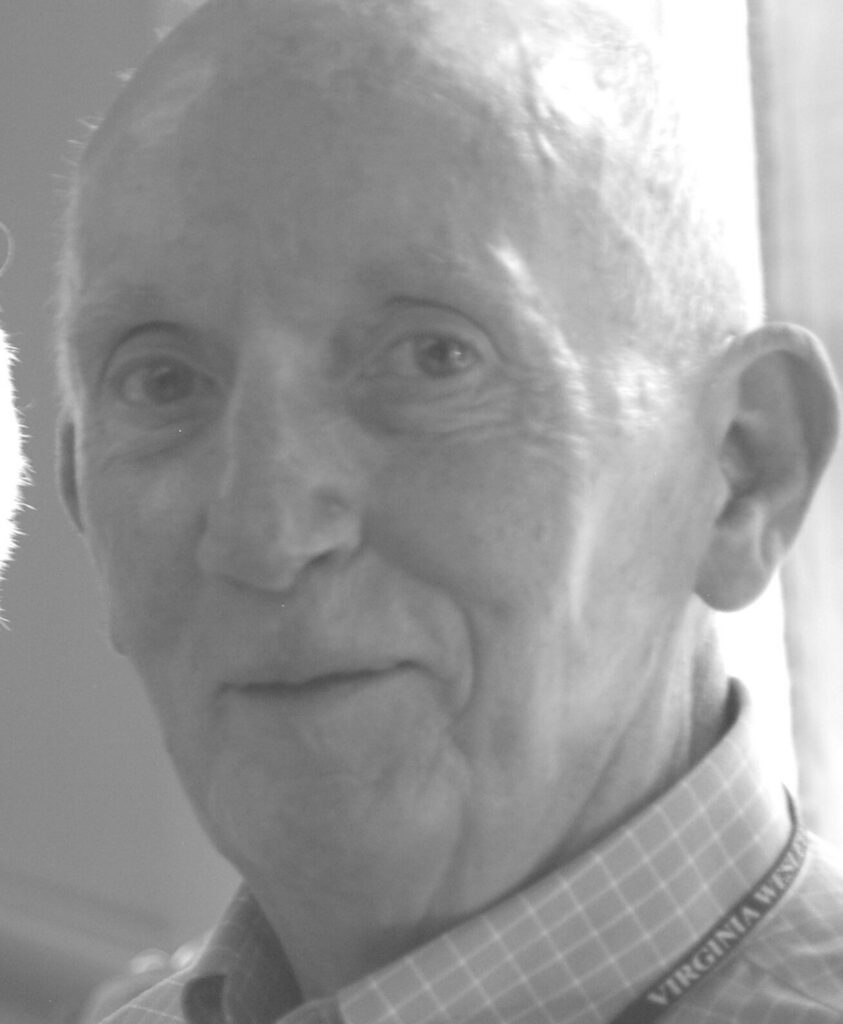 Close-up portrait of elderly man smiling