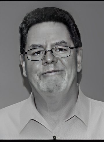 Smiling middle-aged man wearing glasses