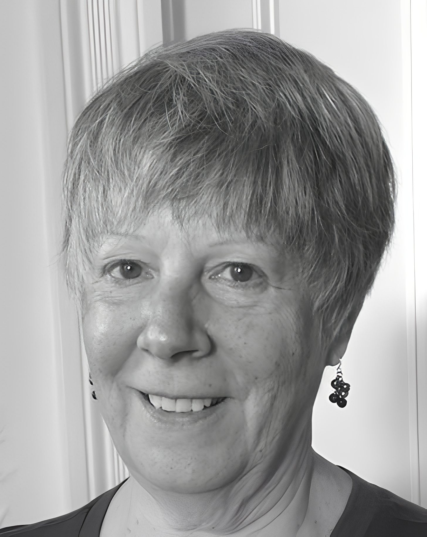 Black and white portrait of smiling woman