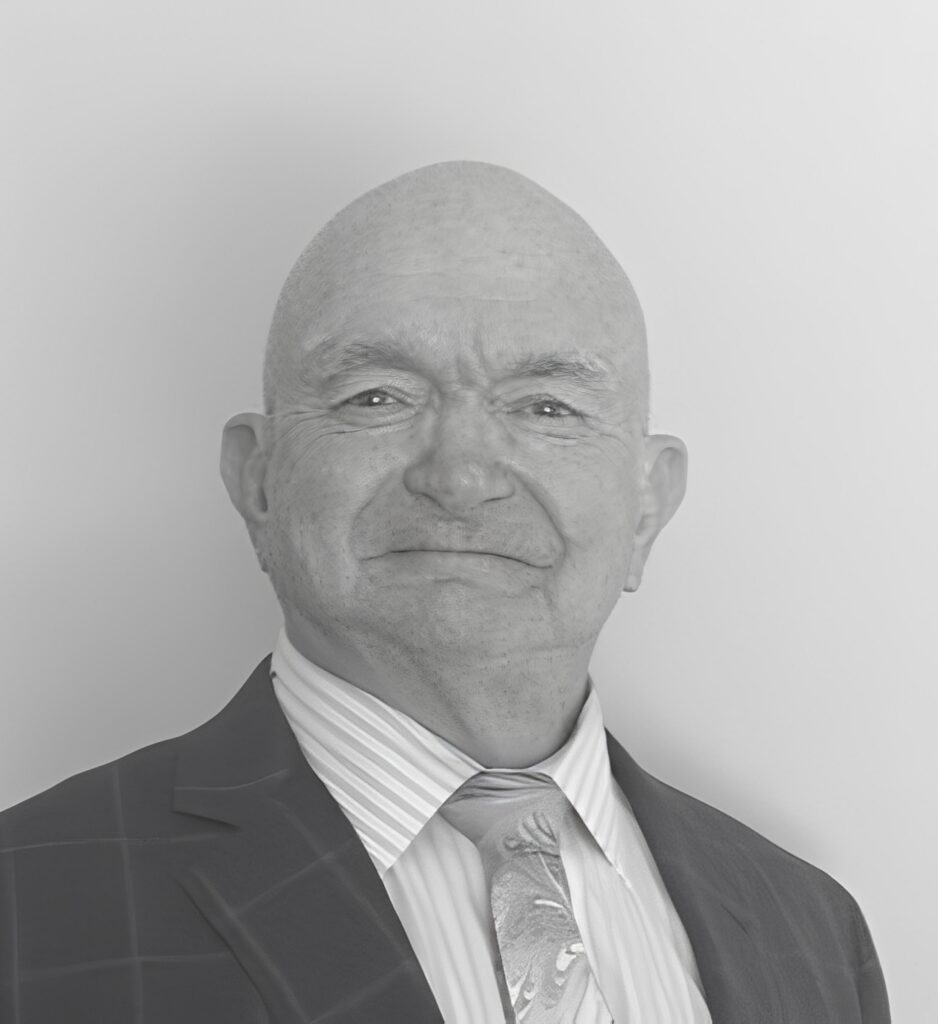Smiling bald man in suit and tie