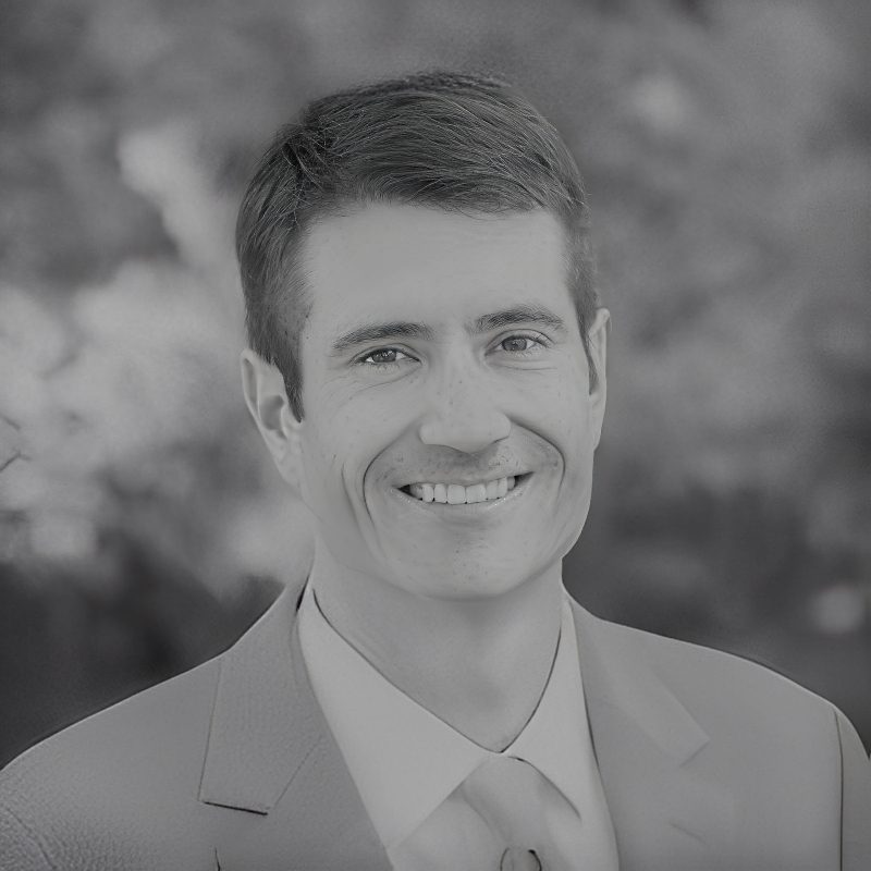 Smiling man in suit outdoors portrait