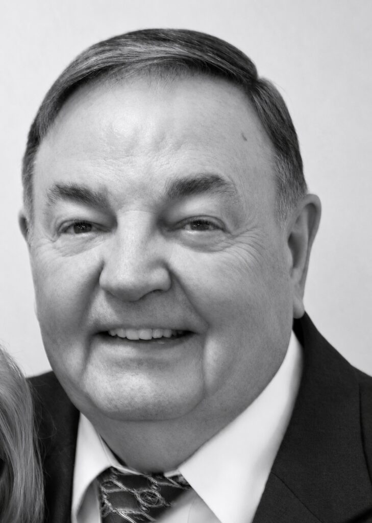 Smiling man in suit and tie