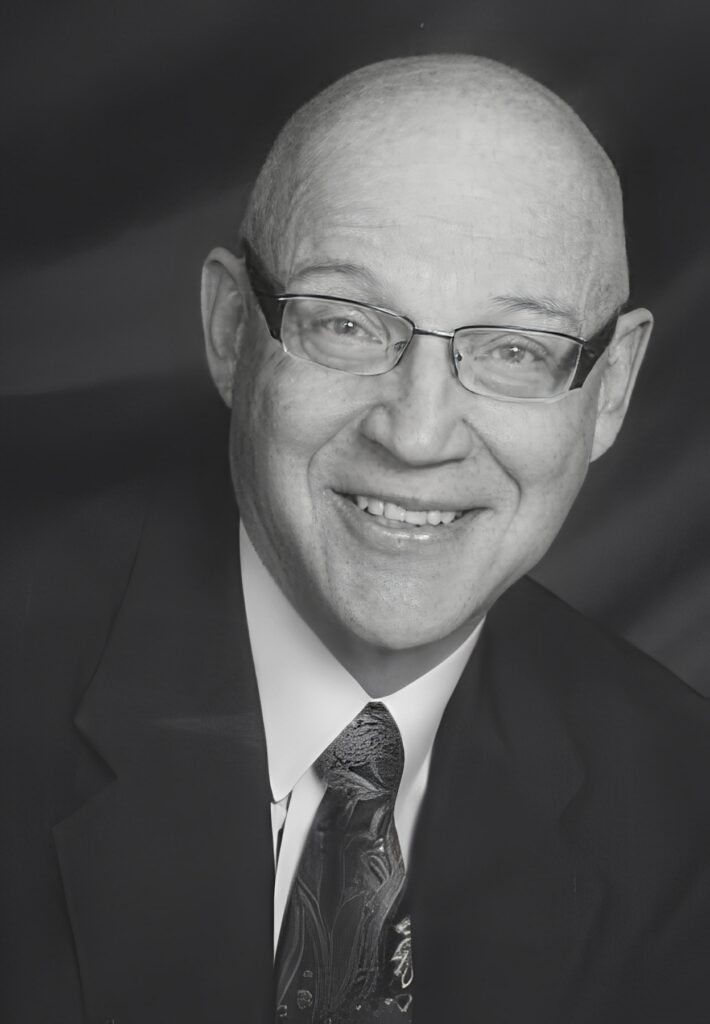 Smiling older man in suit and tie