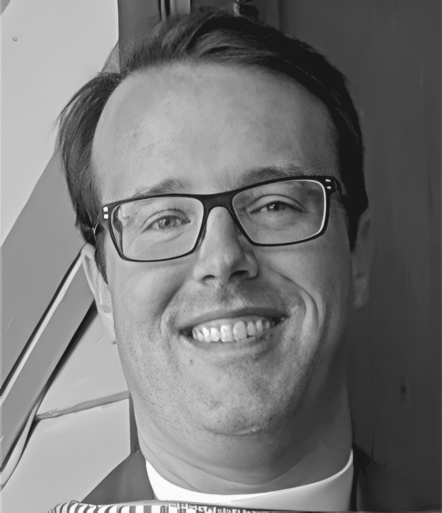 Smiling man wearing glasses close-up portrait